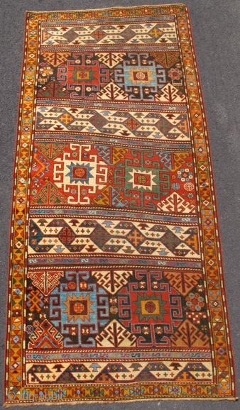Shahsevan Rug, 19th C (3rd Q), The striped patterns of alternating geometry colorfully drawn in this splendid rug from the south Caucasus may indeed be the largest known antique rendering of this  ...