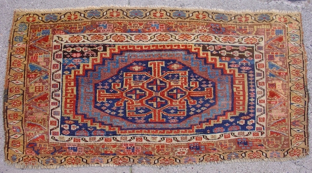 Northwest Persian Kurdish Bagface with Memling gul derived medallion with a great tribal geometric center. Very Nice Colors. 3rd quarter of the 19th century. Size = 2'1" x 4'0". Inv #14872. If  ...