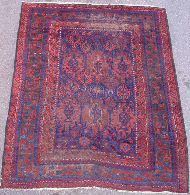 Timuri type Baluch carpet. Squarish proportions, 6'2" x 7'4", with the classic colors of this group including polychromatic blue. Harshang border and pen-box / flame palmette field with several animals woven in  ...