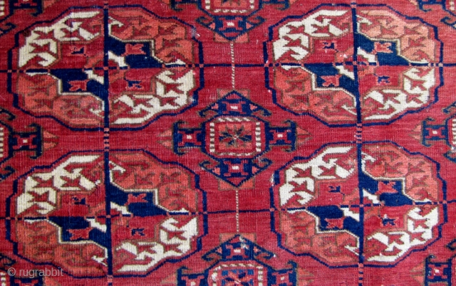 Tekke "dowry" rug. First half 19th century.Proportions, color, beautiful secondaries and a fine weave. Two re-weaves. Small discoloration on upper border. 103x104cms           