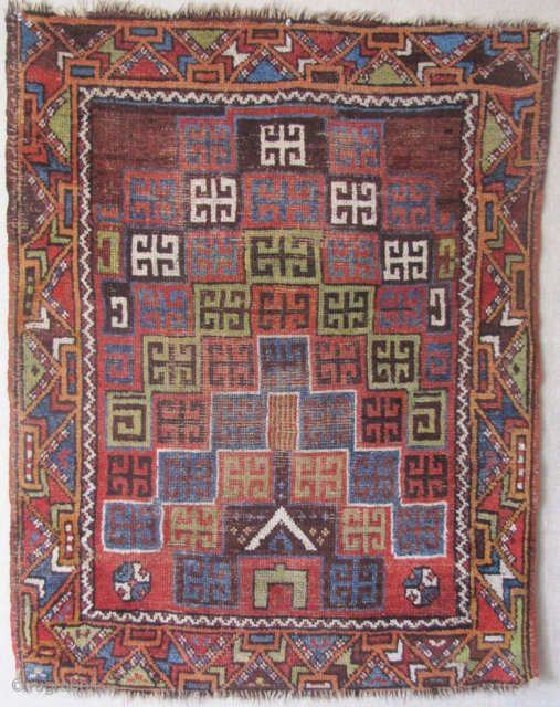 

Central Anatolian prayer rug (Karaman area?) C1870 with an original and creative rendering of ascending niches previously unknown to me. Camel hair wefting(dyed green in the center of the rug) with occasional  ...