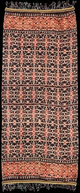 Man's shoulder or hip cloth, hinggi, East Sumba, Indonesia. Warp ikat. Early 20th C. Masterpiece of ikat weaving, most likely from Kenatang given the refinement and intricacy of its patterning: a patola-inspired  ...