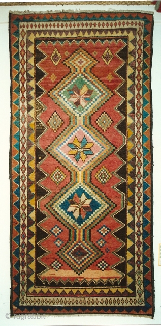 Chahar Mahal Gabbeh ca. 1900.  Natural colors. Pristine condition. 80 X 203 cm, or 38 X 97 in.  Nice tribal piece - good graphics.       
