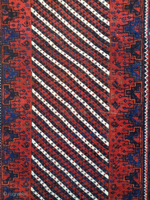 Baluch circa 1900 185 x 90cm (6'1 x 2'11)
Saturated colour and great design
Has a few tension issues like me.              