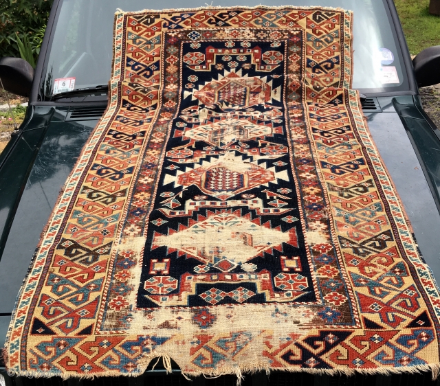 Caucasian Shirvan Karagashli
Multiple Niche 
Bold design & colors
Dark Blue Ground
The Wide Yellow border
Decent age Mid to 3rd quarter 19th
Distressed but not destroyed
3' X 5'4"


         