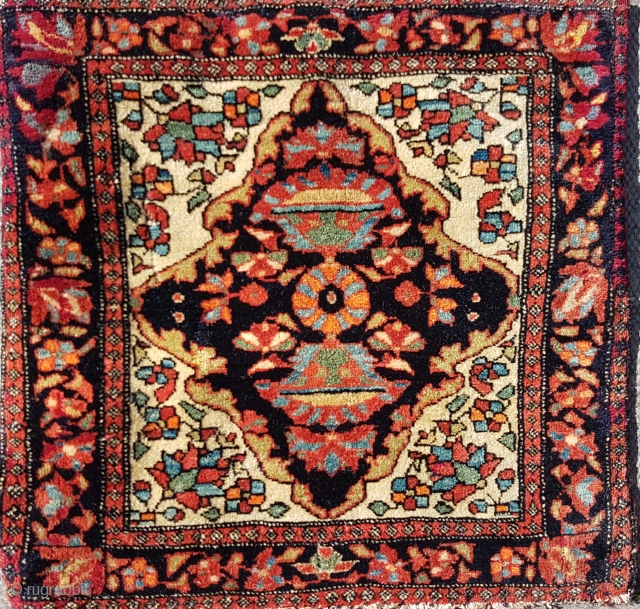 This is a very small  Sarouq Farahan  sampler rug (Vegiereh) showing parts of the design available to a prospective rug buyer or as a weaver's guide 
This small sampler shows  ...