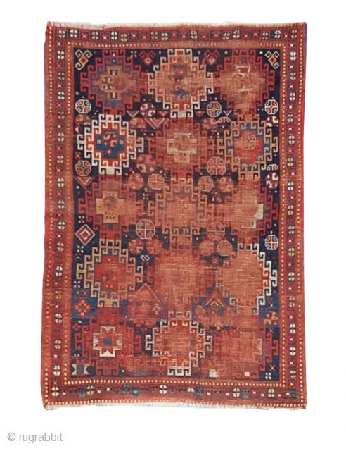 A beautiful though distressed Moghan Kazak. Large Memlig gul. A very attractive drawing 
Late 19th century                 