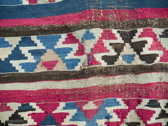 A very old Shirvan kilim. Distressed with one small old repair. Still quite charismatic
Size:  6.6x4.6 feet  
The archaic design of this Shirvan kilim is describes in Yanni Petsopoulos' book Kilims  ...