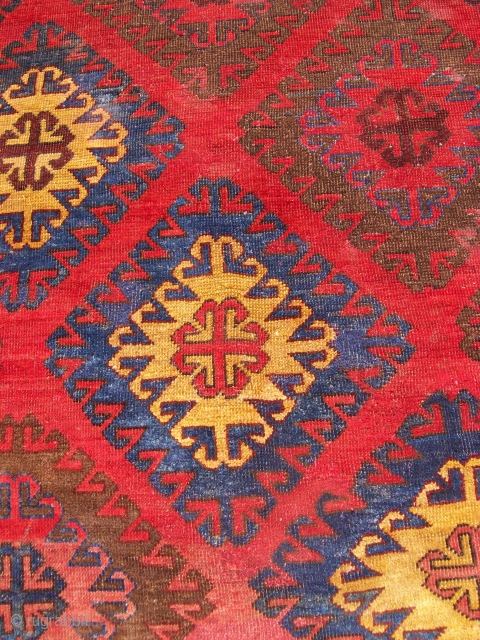 Kirghizistan, last quarter XIX c. cm 241 x 232, wool on wool. Three lines of knots missed at lower end. Beautiful border, rare item! Thanks for watching!      