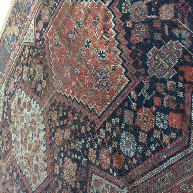 1880's QASHQAI 6x9 Rug:
Also known as Shiraz rug, this Qashqai Rug is a definite treasure. 
This wool rug hand made in Iran is 6x9, very thin, all over wear, all over pattern,  ...