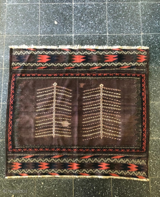 An old Baluch Sofreh about 100 years,size:120x115 cm,wool on wool,very unusuall tree design,two old repairs.pls not to hesitate to ask me any question about this nice Baluch.      