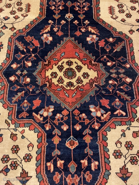 An Antique Farahan-Persian about 100 years,very nice naturall colrs,over all good condition,a very small repair in the corner. size:194x130 cm             