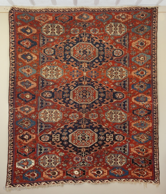 A spectacular 7'5"x 8'8" 19th century Caucasian Soumak. All boarders intact excellent condition except two small areas of fold wear and some corroded browns.         