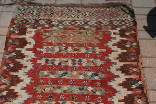 A 3'10"x5'2" Mid 19th century Anatolian Kilim. Beautiful old colors, some worn areas, and repairs.                  