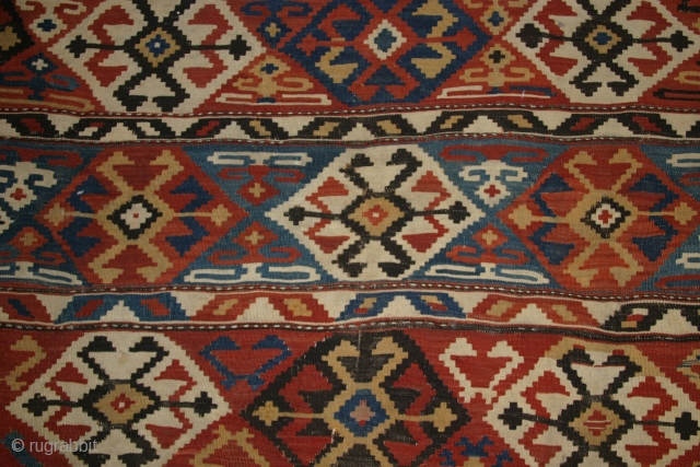 A 6'2"x8'2" Antique caucasian Kilim, nice colors, good overall condition with a couple small holes.                  