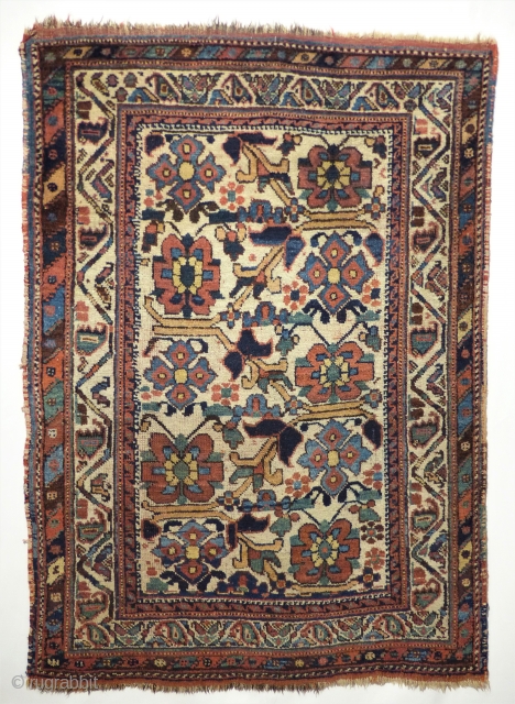 19th century small Afshar rug with white basic colors.
Original natural colors
Good condition, very rare size and design
Wool on wool
Size 120 x 84 cm
          