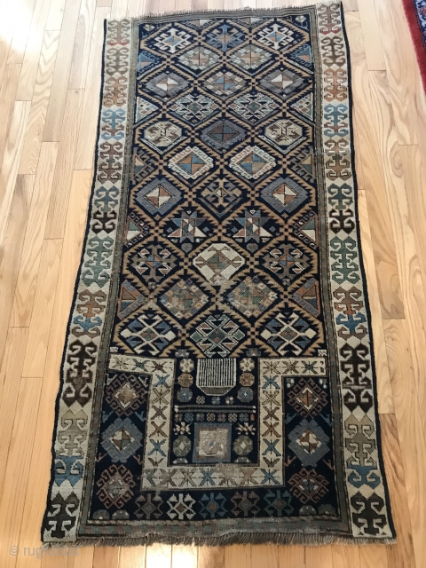 Akstafa Prayer Rug 30” x 63”  narrow format with a square mihrab with scattered wear, no end borders 

             