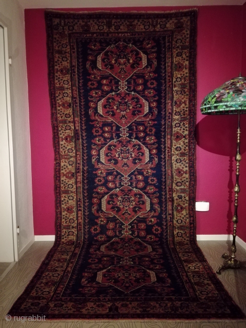 An antique Kömürcü Kula rug with 343/143 cm. Good shape with original endings and some spots of wear. No tinting. Some good old repairs. On wool foundation.      