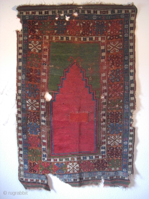 An antique Anatolian prayer rug fragment. All natural dyes. 143 X 93 cm.                    