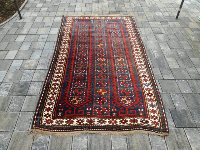 Old Kazak or Karabagh rug with 243/134 cm. Perfect condition with full pile.                    