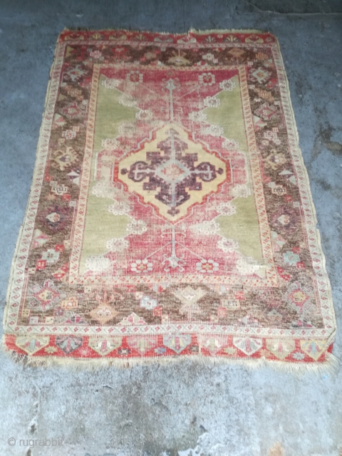 An 1870 Anatolian rug fragment with 160/110 cm.                         