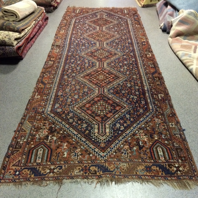 An old Gashgai carpet with 380/140 cm. Good shape for its age, some signs of use.                 