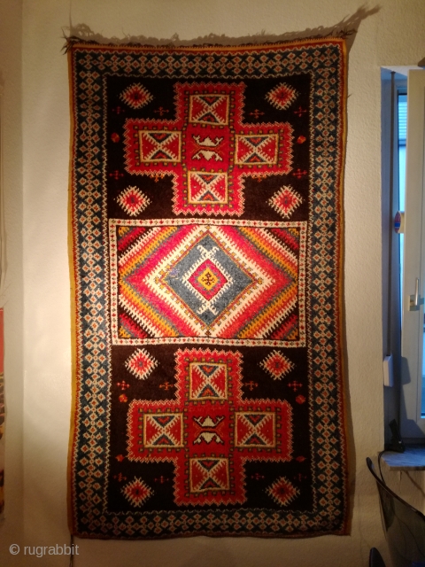 An old Morocco rug with 205/115 cm. Funky. Good shape. I love it.                    