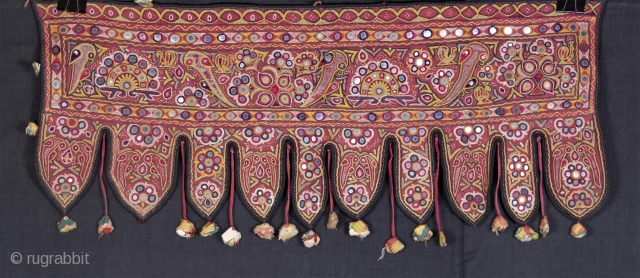 TORAN •
'Embroidered door hanging'

One of the best and rare example of Sodha Rajput embroidery. It has all the elements of Sodha Rajput embroidery technique which includes pakko, kharek, abhla, bhavariyo, satin and  ...