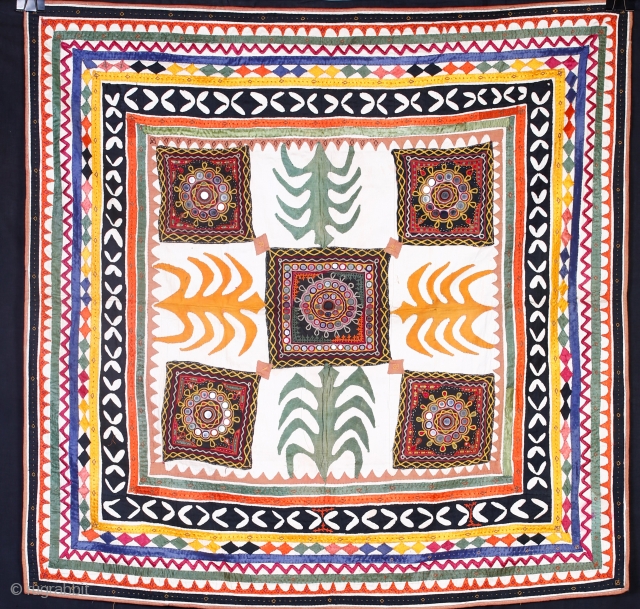 • COVERLET •

A charming vintage applique cloth from Gujarat with brightly coloured patterns in each corner. Square in shape with amazing detailing and combination of applique and embroidery makes it very rare.
The  ...