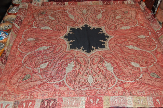 Beautiful 1850s indian pieced shawl in good condition, nice colours and fine embrdoiery, the shawl has been backed with black cotton.            