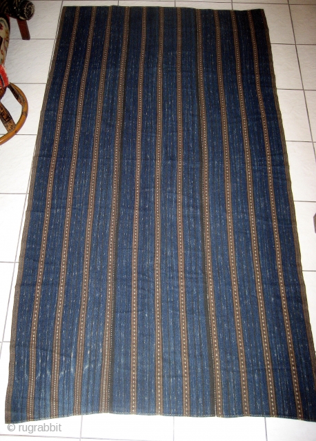 --MEIFU LI MINORITY,HAINAN ISLAND,SOUTH CHINA,-COTTON INDIGO DYED BLANKET, WITH IKAT WORK.-WOVEN IN SECTIONS ON A BACK STRAP LOOM.CIRCA 1950s(approx.5'x 3.5')             