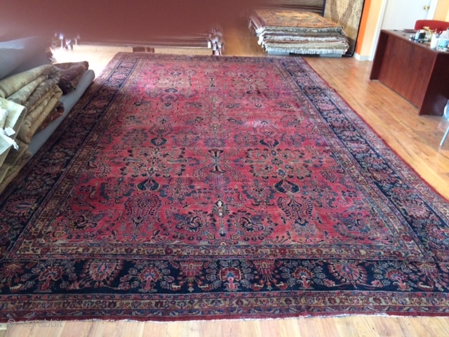 This is an antique Mohajiran Sarouk that is 11'-4" x 19'-7" (error margin 2"). The rug has some missing wool and a few of re-piled areas that are shown in the pictures.  ...