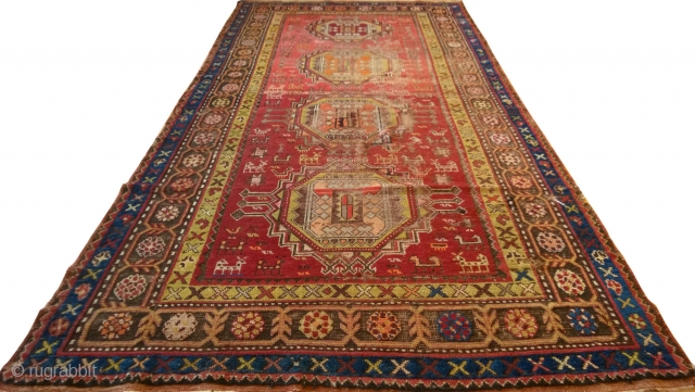 Caucasian Rug
4.02 x 8.52 ft (123 x 260 cm)
Approximately 80 years old. Quite large in size. In pretty good condition but with some color fading and deformation.
      