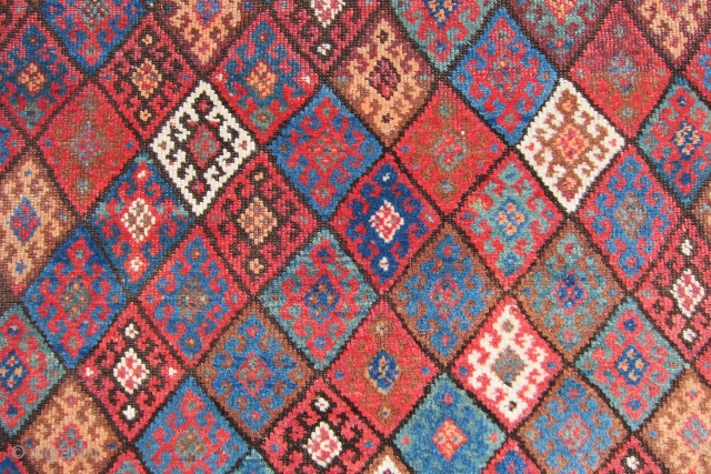 Jaf Kurd rug, Late 19th c., 4'8" x 8'4".  An exceptional Jaf Kurd rug, rare and beautiful. Lovely naturally dyed colors in an amazing display of diamonds.  Approximately, approx. 2  ...