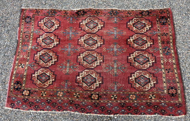 Mid 19th c. Ersari chuval, 34" x 54",  an unusual format with 3 rows of 4  roundish guls all beautifully drawn with excellent spacing.  Field color is a rose  ...