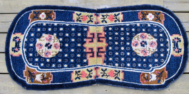 Antique Chinese saddle cover, 4' x 2', excellent condition with soft shiny wool, and well balanced design.  Blue is not as intense, over-saturated, as it appears in the picture.   