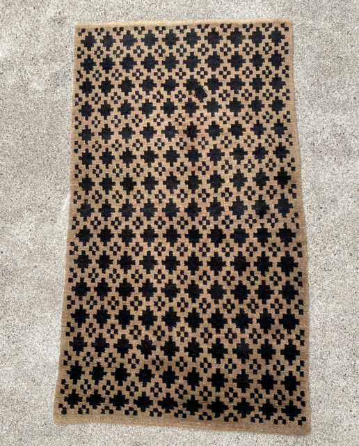 Tibetan sitting rug, circa 1900, 3' x 5'3", camel field with brown stepped diamonds. Excellent condition except for an unobtrusive 3"x3" "in country" repair.  Pile is soft and thick and perfect  ...