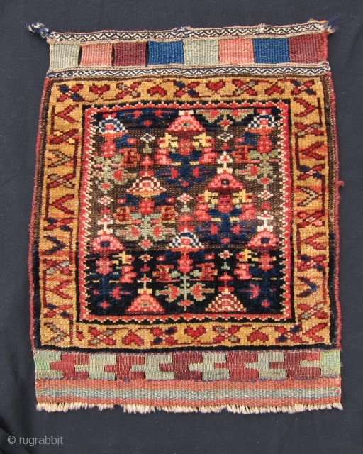 Laate 19th C. Kurd bag face, 2' x 1'7", This Kurdish bag face is a fine example of the positive effects of corrosion of the background brown wool in oriental rugs and  ...