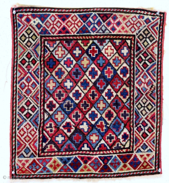 Shahsavan pile bagface, late 19th c., 21" x 23".  Shahsavan pile bag featuring a diamond lattice field enclosing multicolored crosses. An interesting border design and lovely natural colors.    