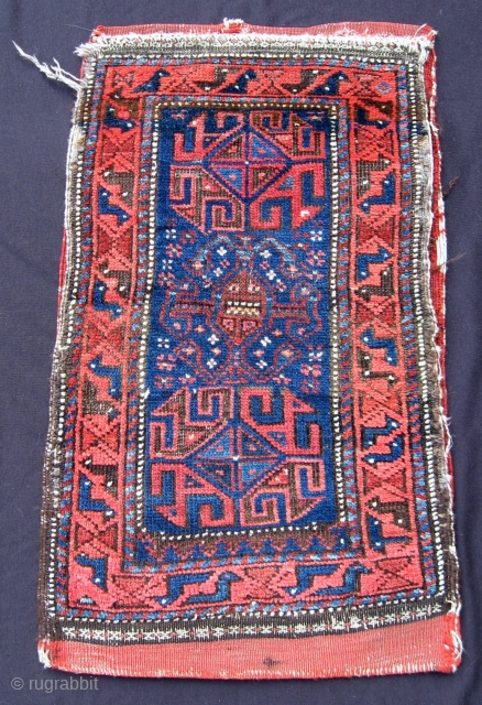 Rare Baluch pushti including back, 19th C. ex-Nicky Eltz, 28" x 16" Good pile, color, and very interesting design features.  Animal head border with distinctive white eyes.  Unusual field composition.  ...