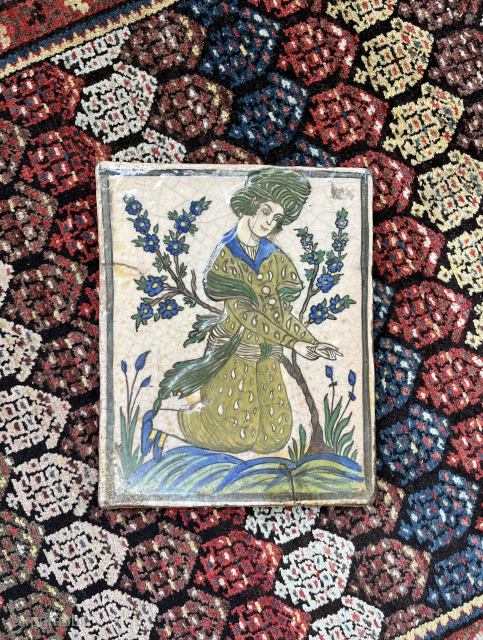 Qajar ear tile glazed as Iznik gardener with tree of life
30x25