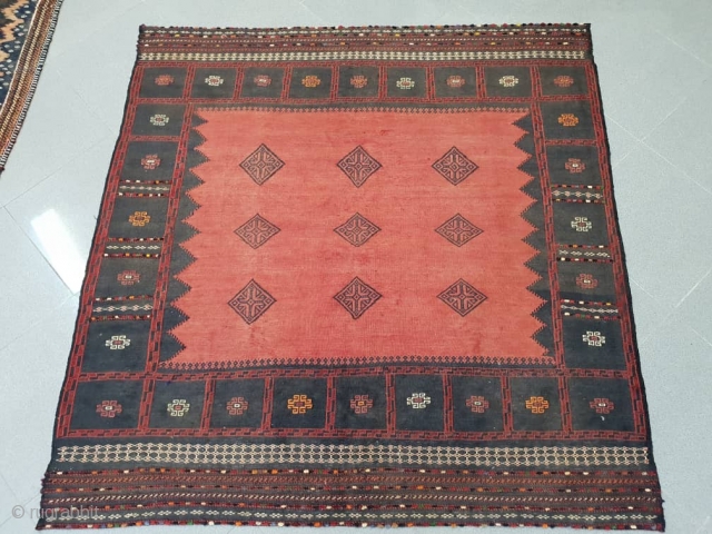 Rare baluch sofreh in red , with nine stars ,borders are oriented with colourful  piles stars , endings are folded
Circa 1950 , 150 * 145 cm 
A real tribal treasure  