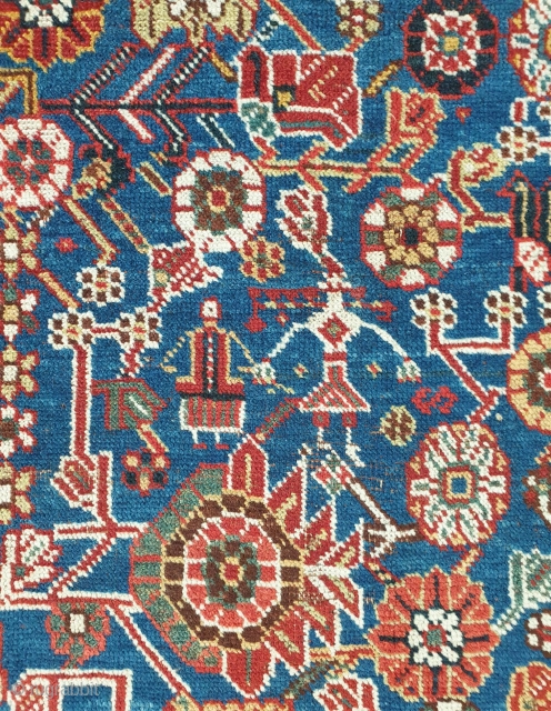 Mersmerisizng burst of flowers on this blue field qashqai rug makes this rug an collectible item , almost in excellent condition. Borders has very unique design, it is possibly woven by IGDIR  ...