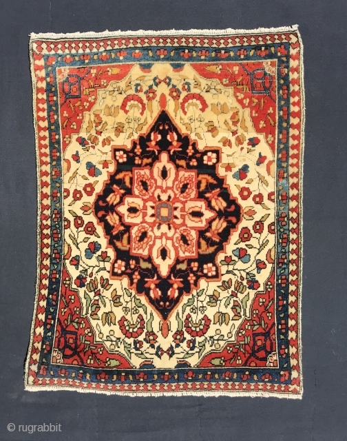 Ref 1623 Kashan pushti circa 1900 most probably Mohtashem. 90 x 44 - 3'0 x 1'6.  Good condition with purple silk overcasting.          