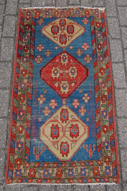 Antique North West Persian Heriz area village rug  141 x 76 cm (4ft 8" x 2ft 6") Last quarter 19th century. All natural dyes. Condition: used, good evenly low pile with  ...