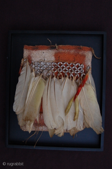 Ethnographic Asmat tribe plant fibre bag with plant seed "beads" and feather decoration 21 x 26 cm (8" x 10") Papua New Guinea. Condition: very good, mounted on a frame.   