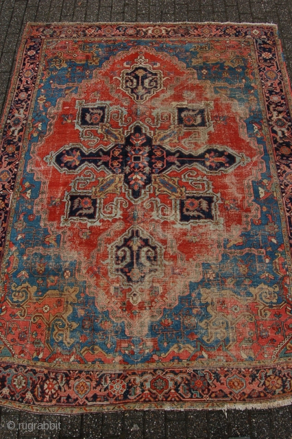 Antique Serapi design Heriz 292 x 220 cm (9ft 5" x 7ft 4") 3rd quarter 19th century. All natural dyestuffs. Condition as found and according to age, evenly low pile (areas of  ...