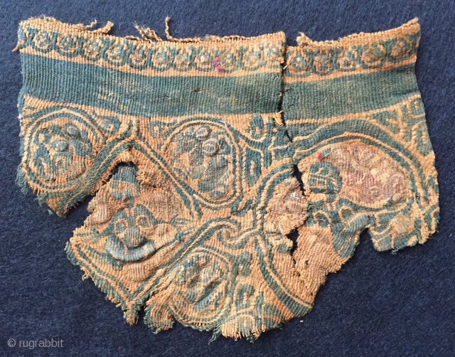 Small fragment of Egyptian tapestry weave from 6-7th century.
Human figures and some mythical animals are designed and woven in a small scale.           