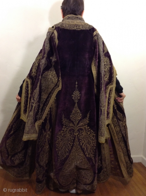 Full length Turkish woman's robe with open sleeves. Beautiful deep purple silk velvet with gold metal thread using couching style decoration.  I am guessing that it was made before the First  ...