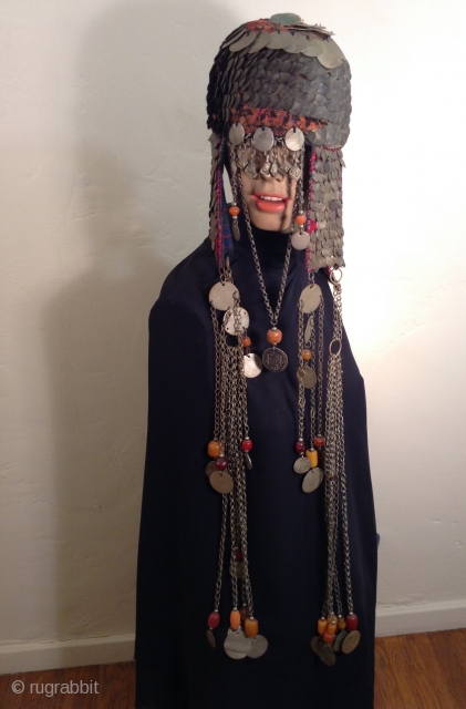 This is a very dramatic headpiece that i believe comes from the Bedouin Nomadic people who lived in the Negev Desert area of Israel. Most of the Bedouin now live in towns.  ...